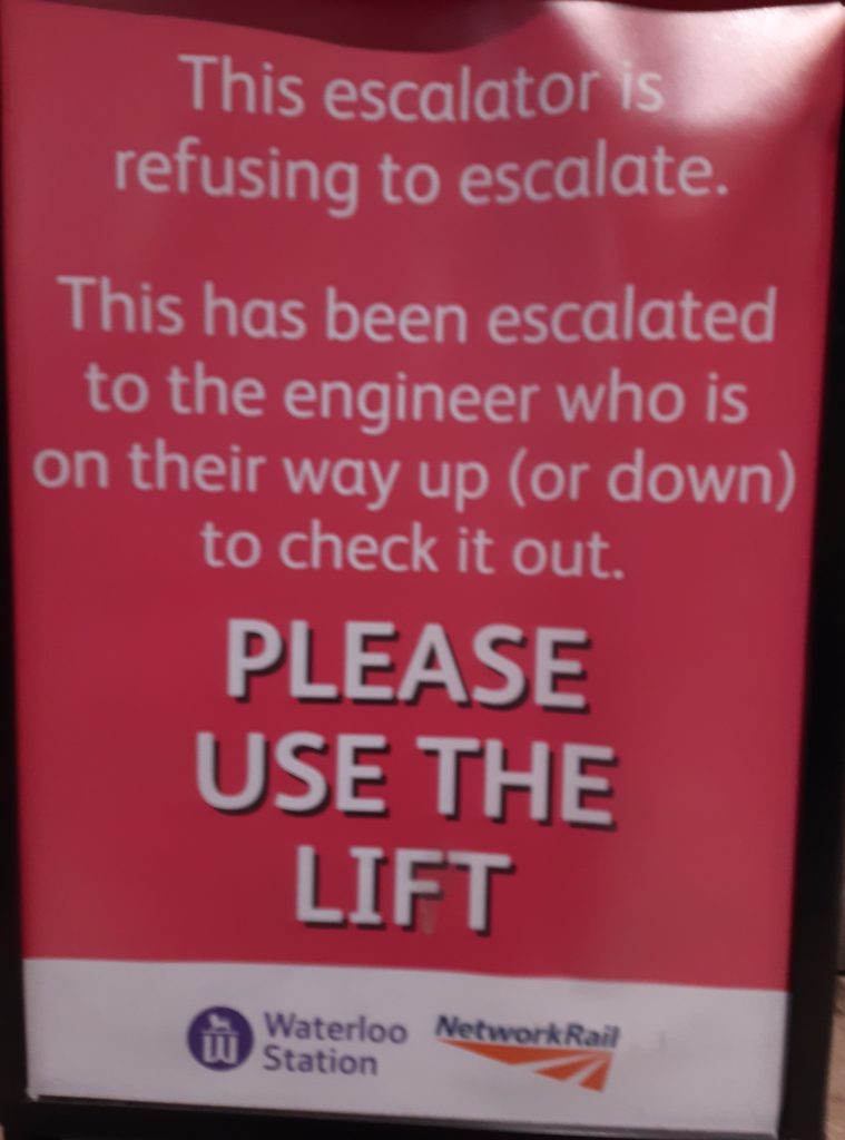 Notice by escalator at Waterloo station